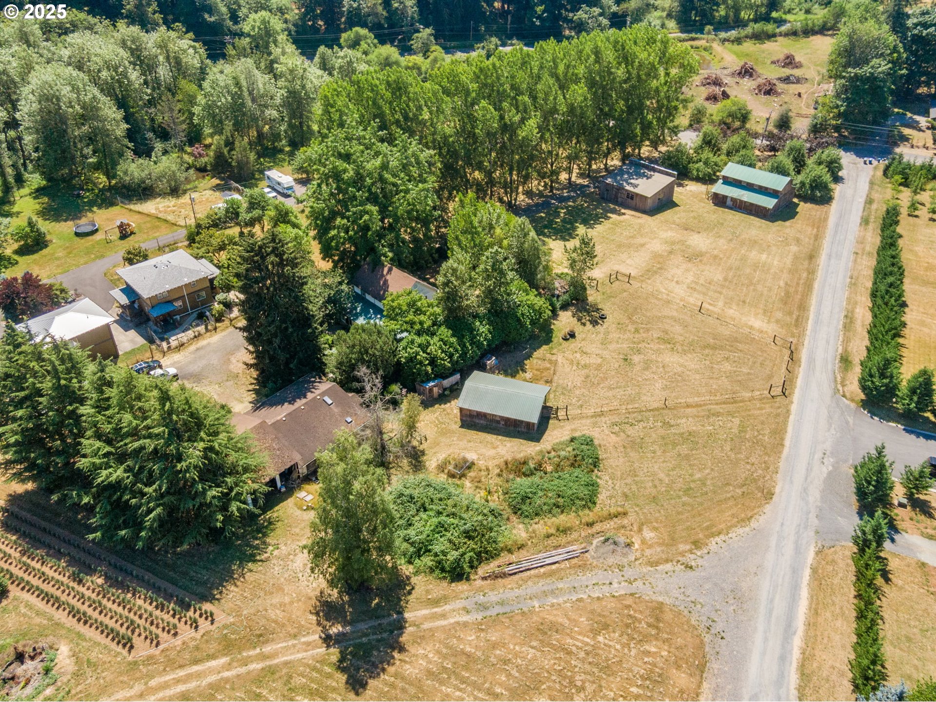 12040 Southeast Revenue Road Boring, OR 97009 - Photo 44 of 46 an aerial view of a house with a yard