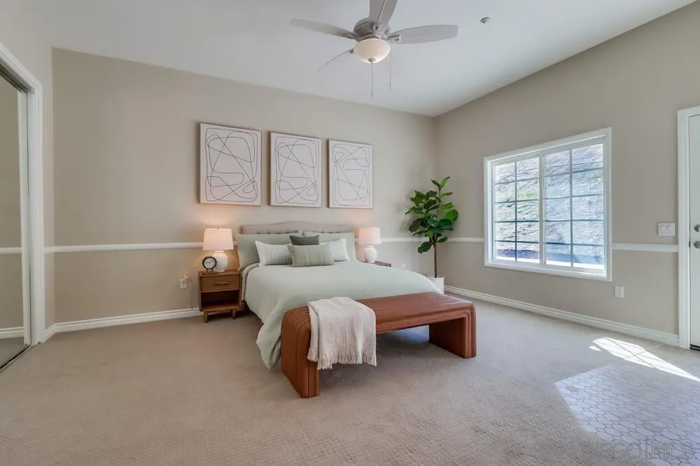 8837 Diamondback Drive Santee, CA 92071 - Photo 20 of 37 a bed room with a bed and a window