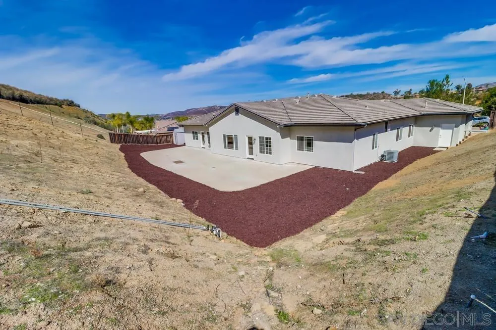 8837 Diamondback Drive Santee, CA 92071 - Photo 32 of 37 a view of a house with a snow in the background