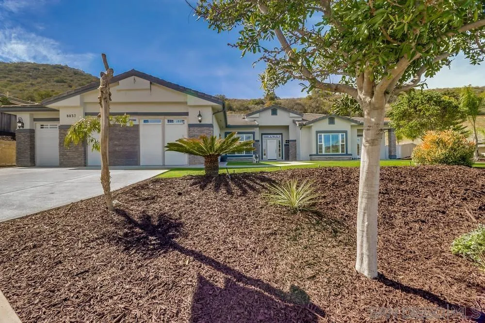 8837 Diamondback Drive Santee, CA 92071 - Photo 35 of 37 a front view of a house with garden