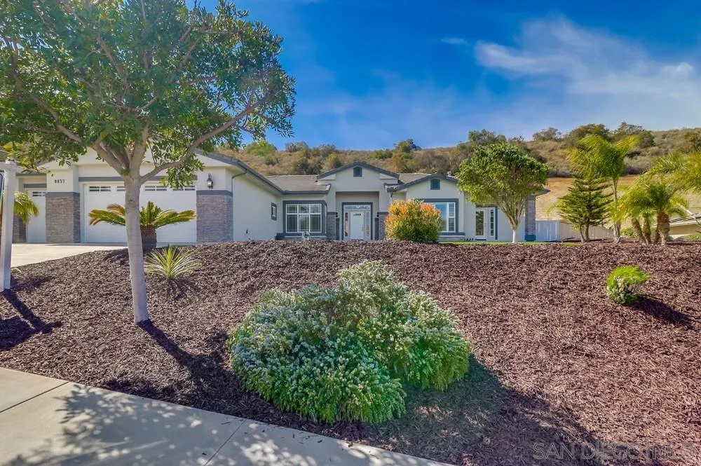 8837 Diamondback Drive Santee, CA 92071 - Photo 36 of 37 a view of a house with a yard