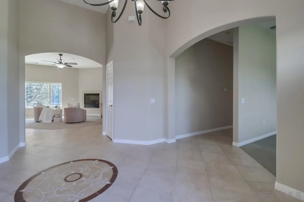 8837 Diamondback Drive Santee, CA 92071 - Photo 4 of 37 a bathroom with a sink and mirror