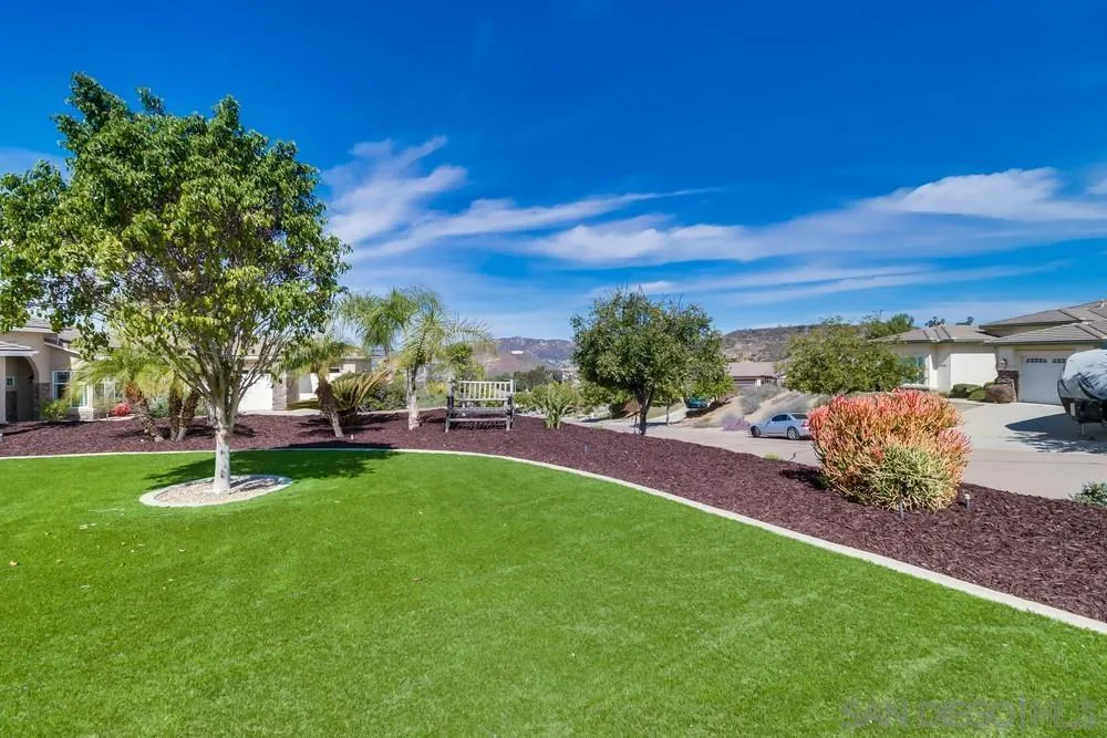 8837 Diamondback Drive Santee, CA 92071 - Photo 5 of 37 a view of a garden with trees