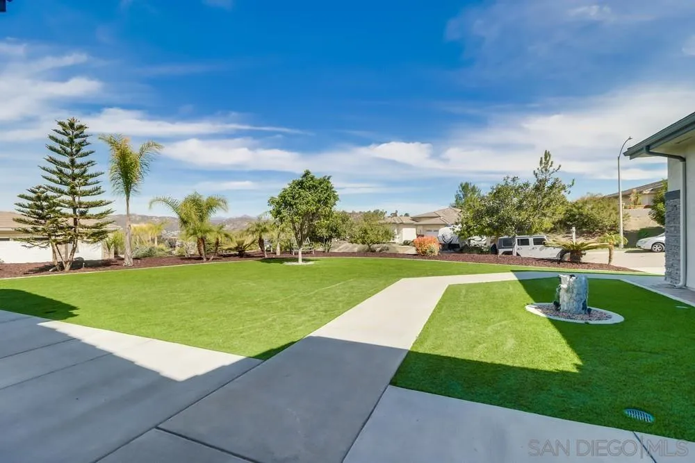 8837 Diamondback Drive Santee, CA 92071 - Photo 6 of 37 a view of yard with swimming pool and green space