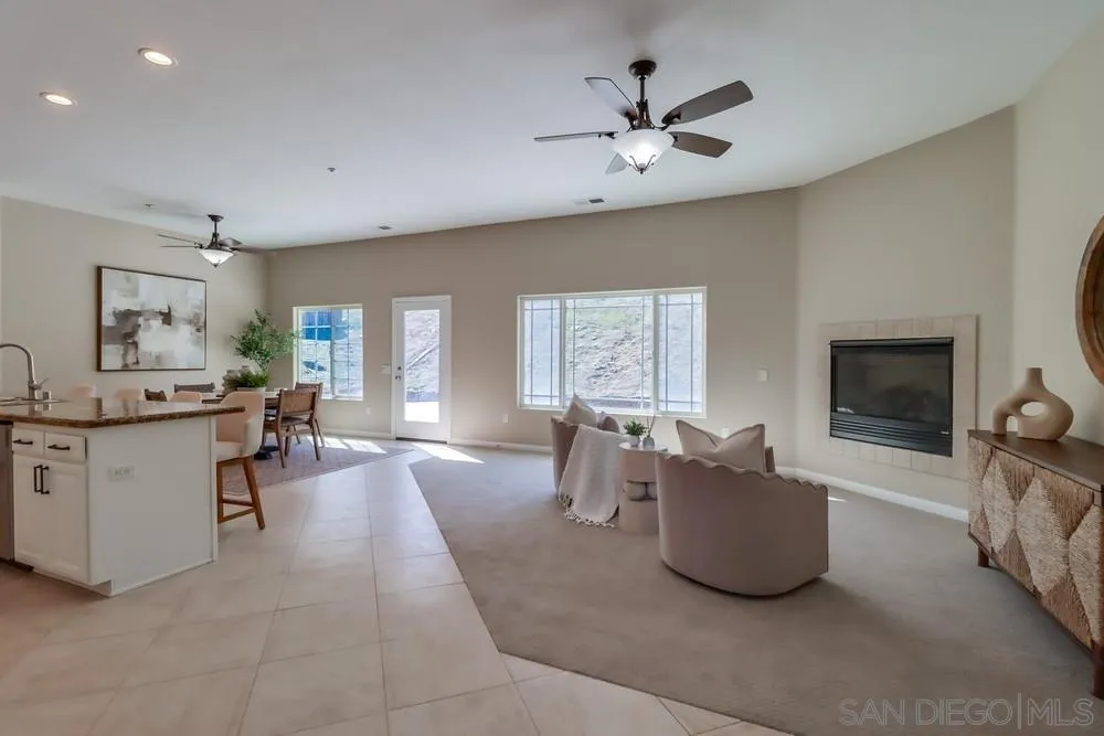 8837 Diamondback Drive Santee, CA 92071 - Photo 10 of 37 a living room with furniture and a flat screen tv
