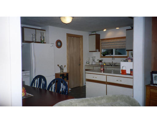 18 Fargo Street Springfield, MA 01109 - Photo 3 of 6 a kitchen with a table and chairs