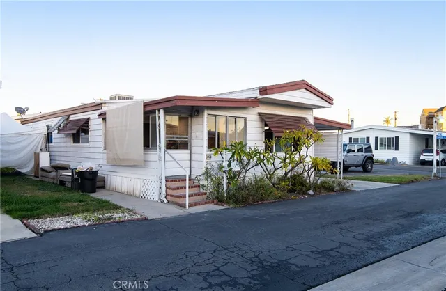 a view of a house with a garden