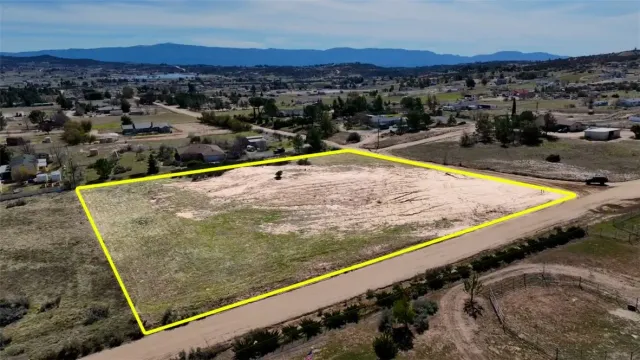 a view of swimming pool with a mountain