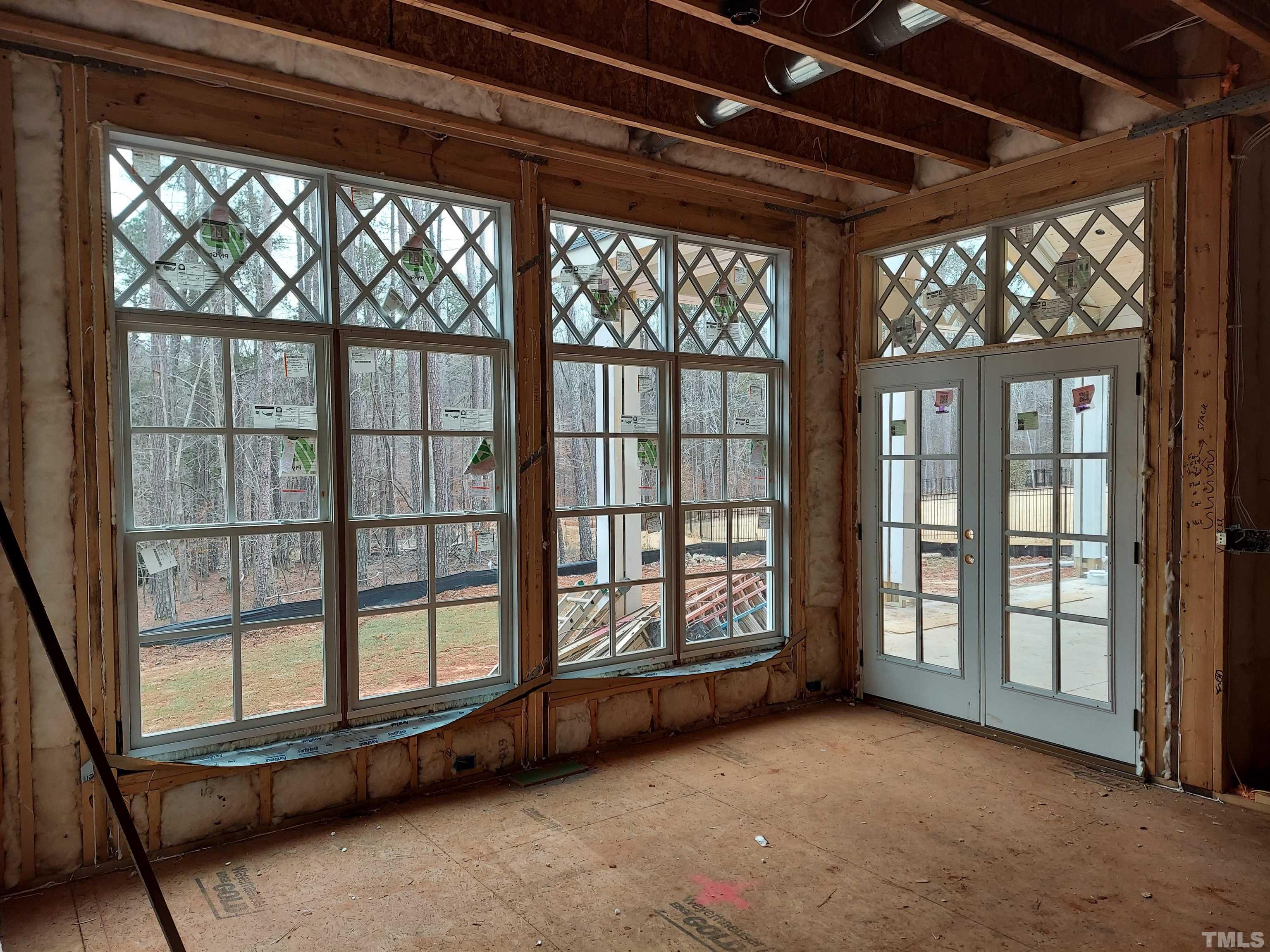 5017 Winding View Lane Raleigh, NC 27615 - Photo 4 of 6 a view of an empty room with a window