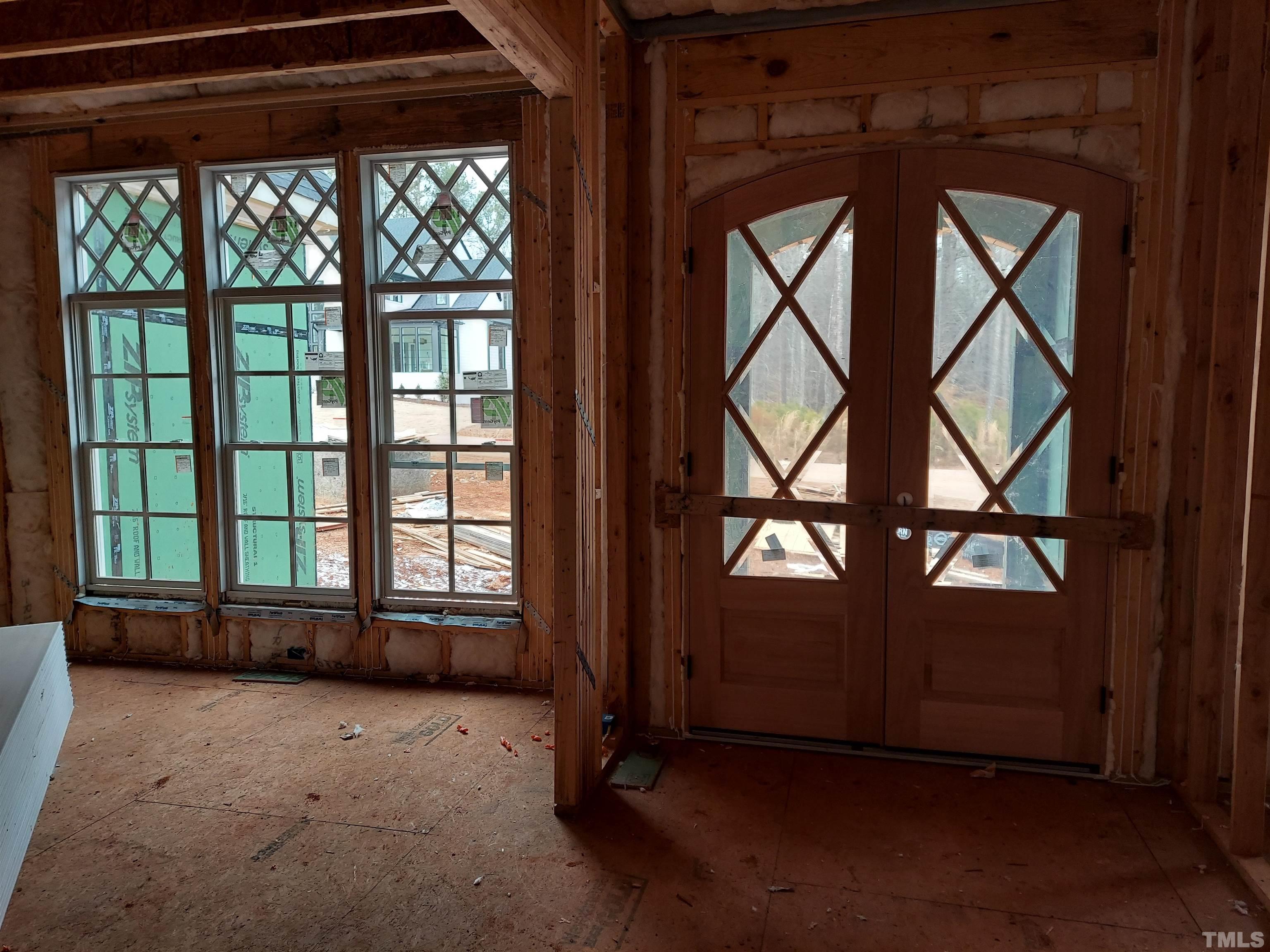 5017 Winding View Lane Raleigh, NC 27615 - Photo 6 of 6 an empty room with windows and closet