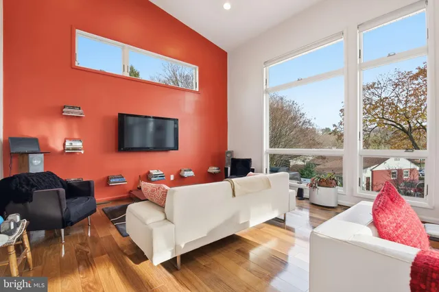 a view of a patio with a table and chairs