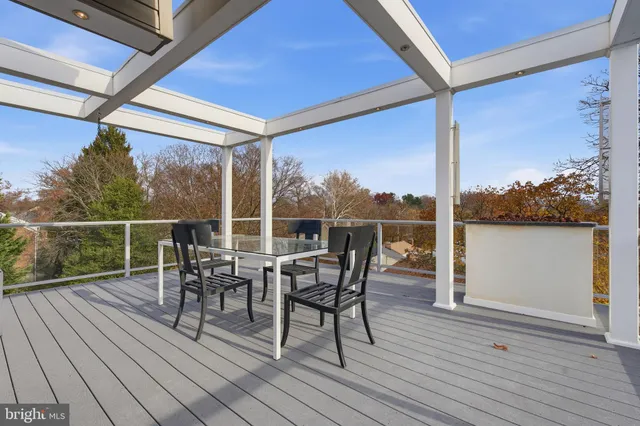 a view of swimming pool from a balcony