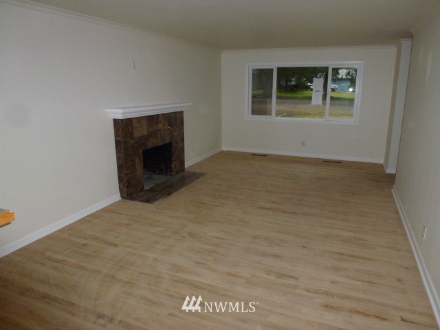 7115 Morgan Road Everett, WA 98203 - Photo 5 of 13 a view of an empty room with a window