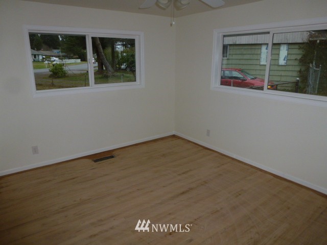 7115 Morgan Road Everett, WA 98203 - Photo 9 of 13 an empty room with a window