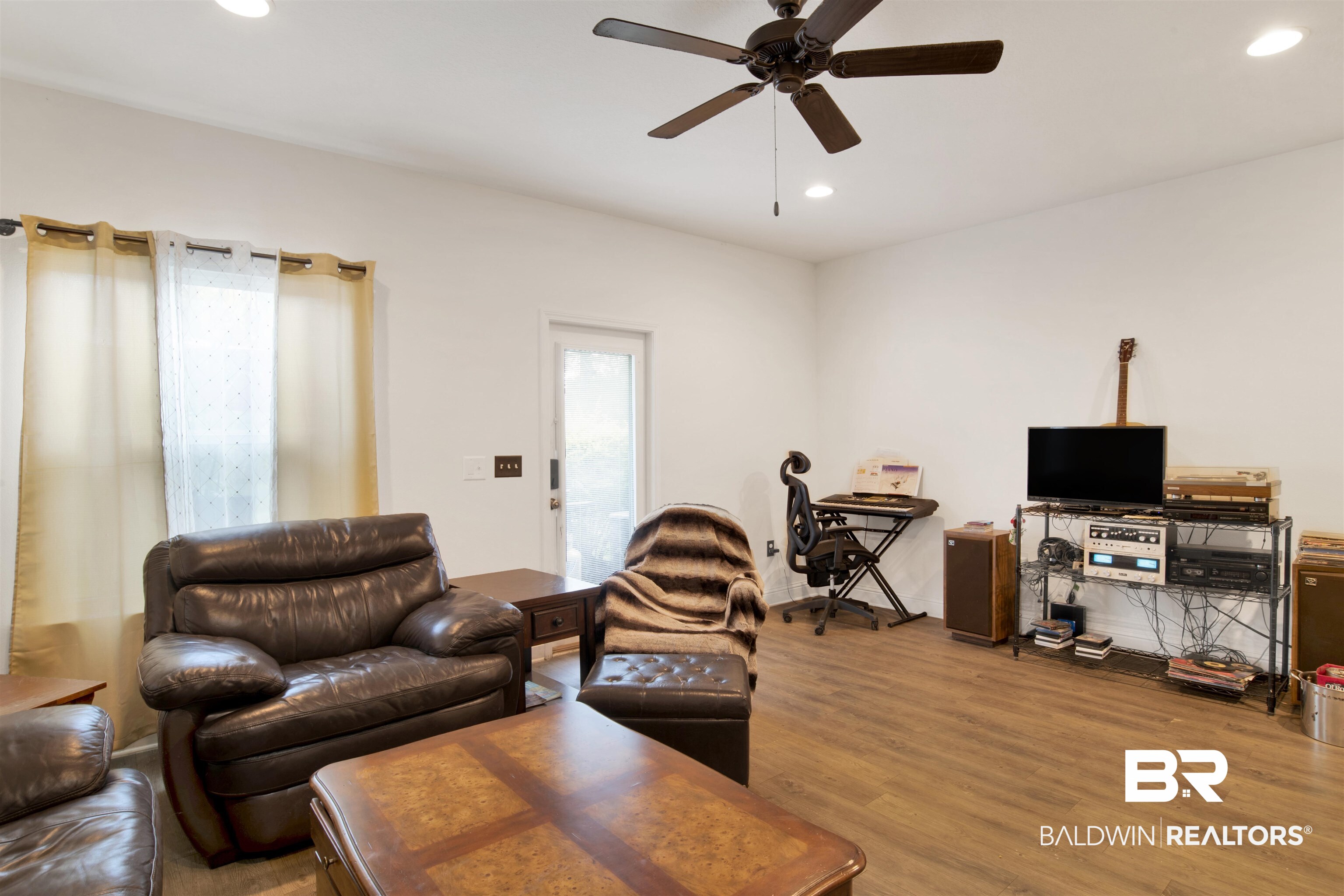25806 Pollard Road, Unit 80 Daphne, AL 36526 - Photo 19 of 30 Living room featuring recessed lighting, wood finished floors, and a ceiling fan