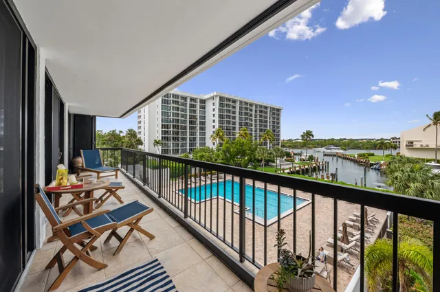 a view of balcony with furniture