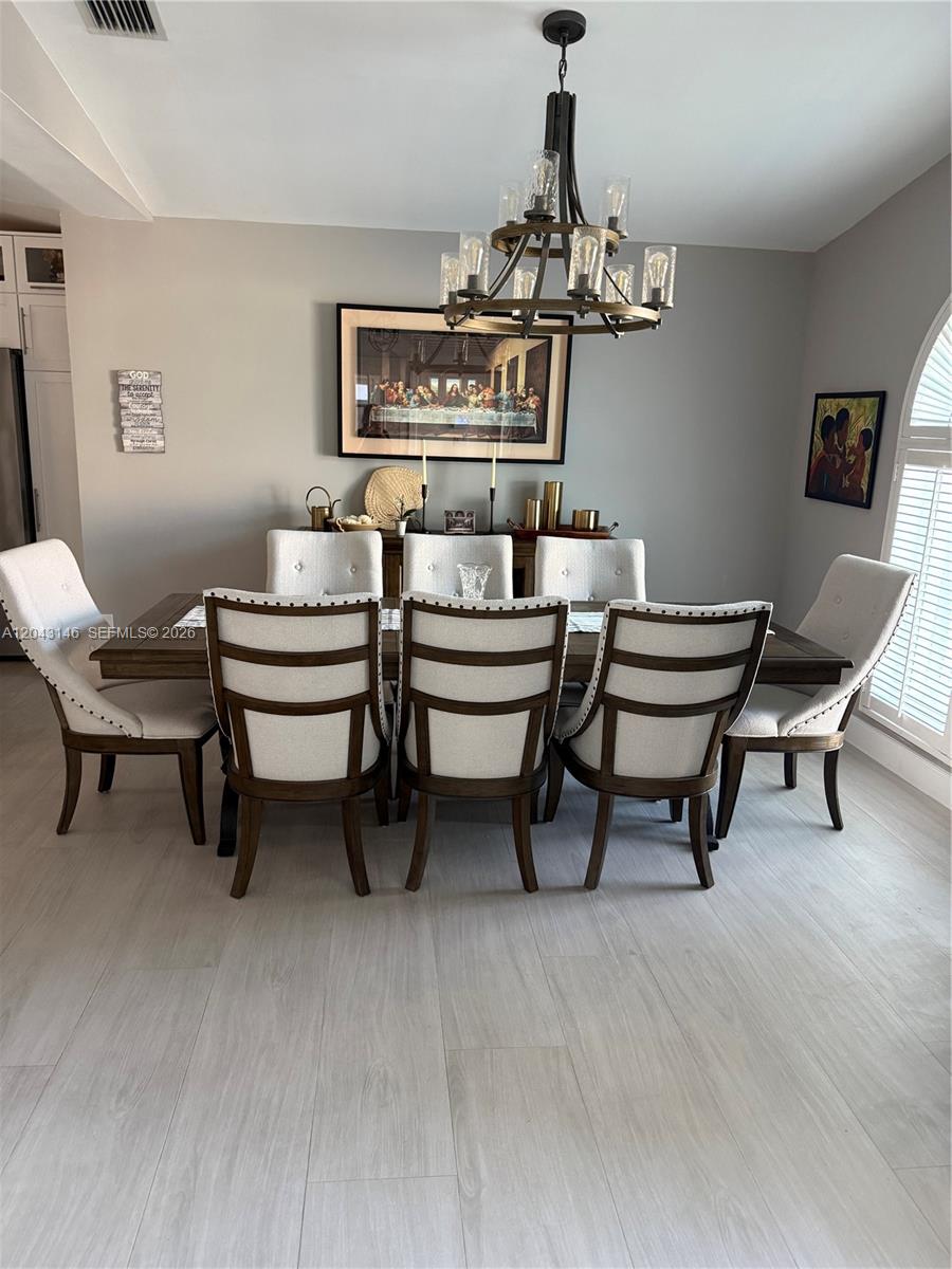 4947 Southwest 143rd Avenue Miami, FL 33175 - Photo 5 of 19 The dining room area to the right of the house entrance.
