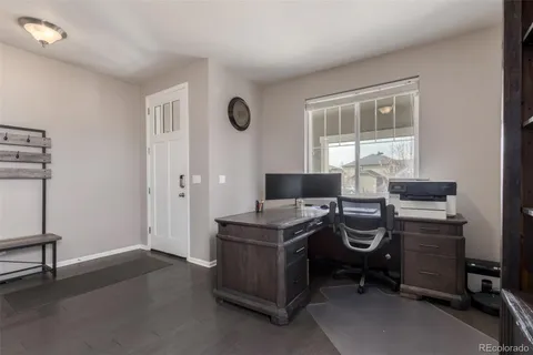 a view of a workspace with furniture