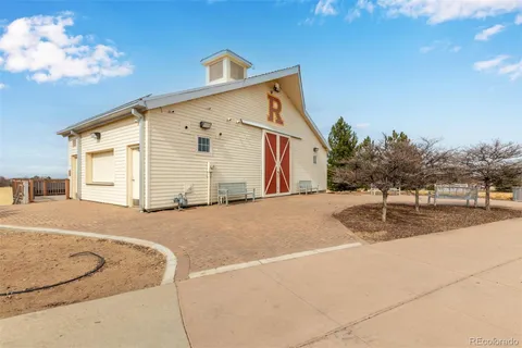 a very nice looking house with a yard