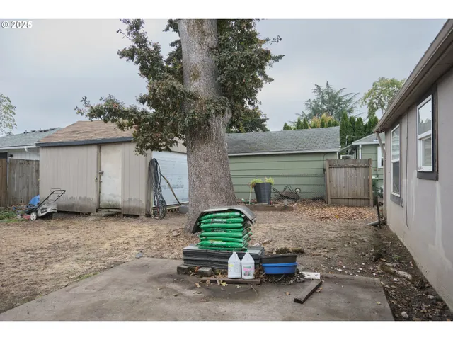 a backyard of a house with seating space