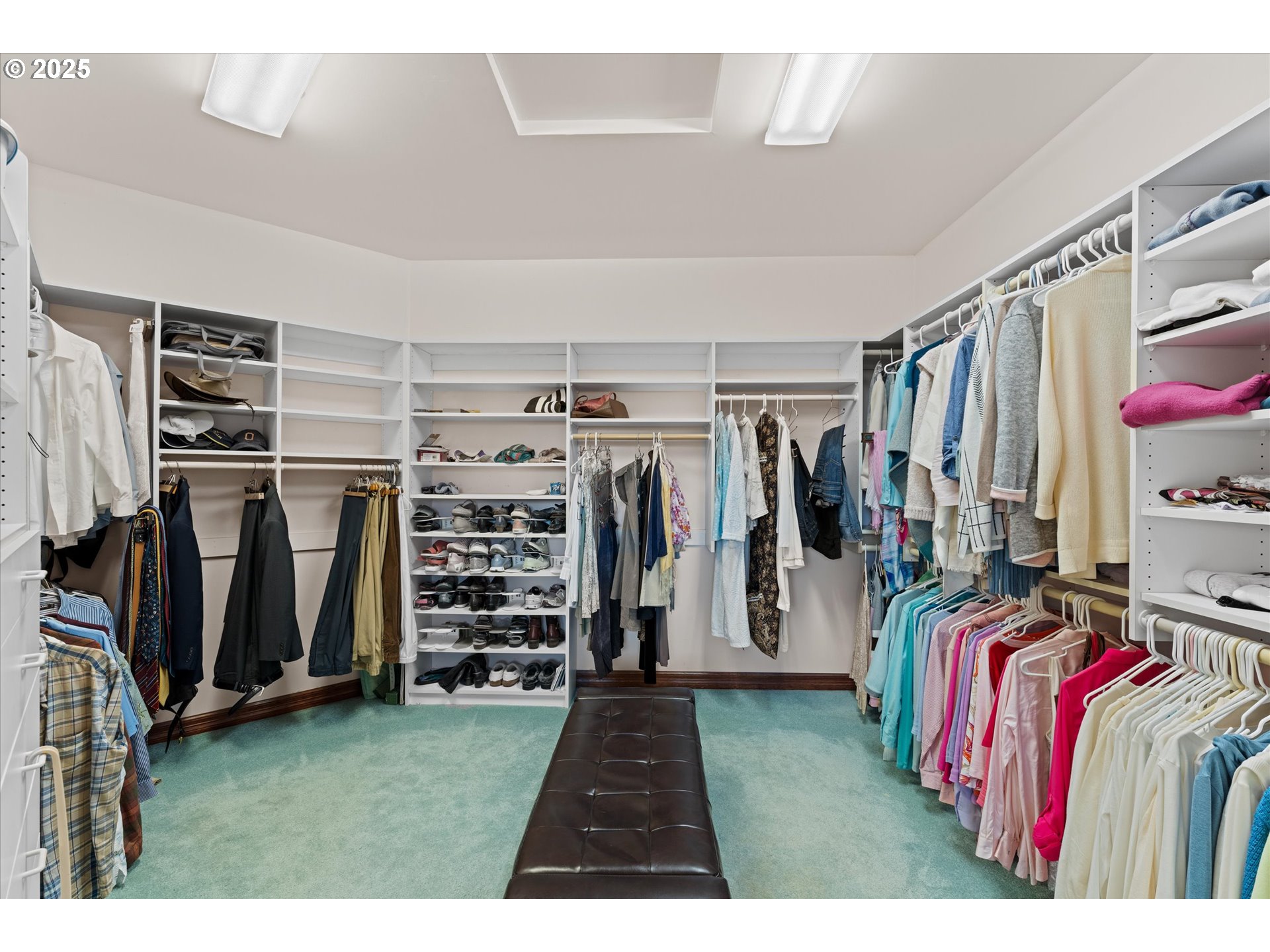13680 Southwest Morgan Road Sherwood, OR 97140 - Photo 13 of 48 a view of walk in closet with clothes and shoes