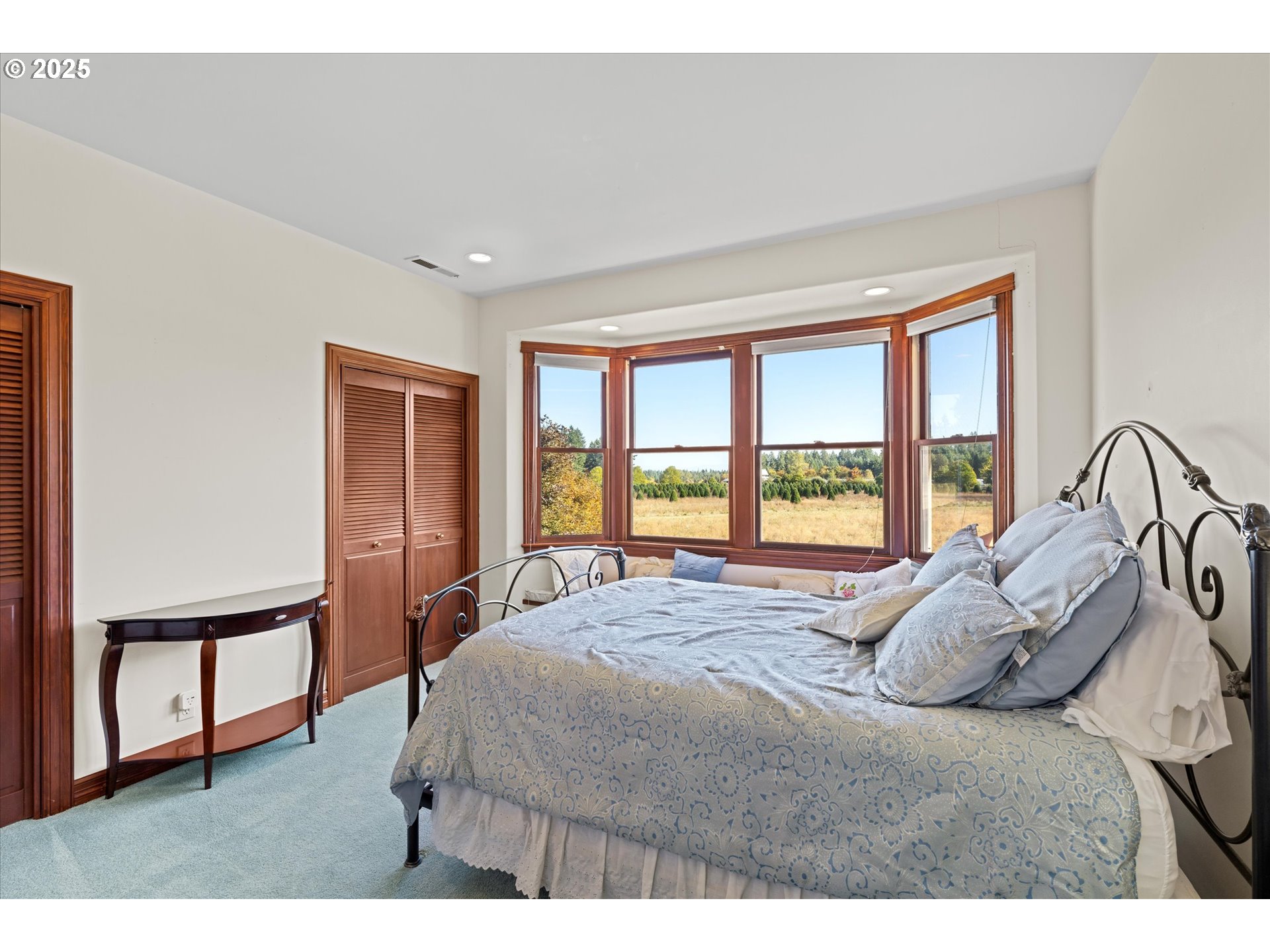13680 Southwest Morgan Road Sherwood, OR 97140 - Photo 17 of 48 a bedroom with a bed next to a window with outer view