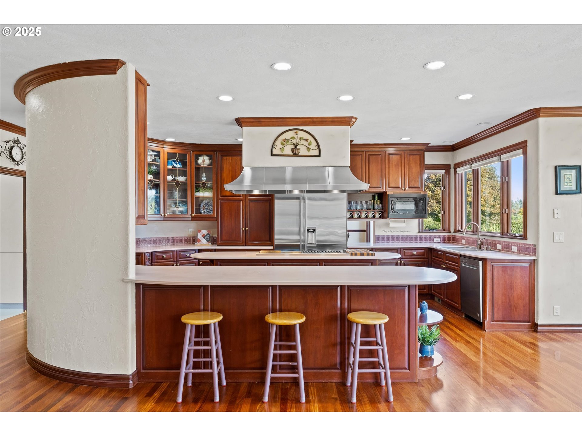 13680 Southwest Morgan Road Sherwood, OR 97140 - Photo 27 of 48 a kitchen with stainless steel appliances granite countertop a sink and a refrigerator