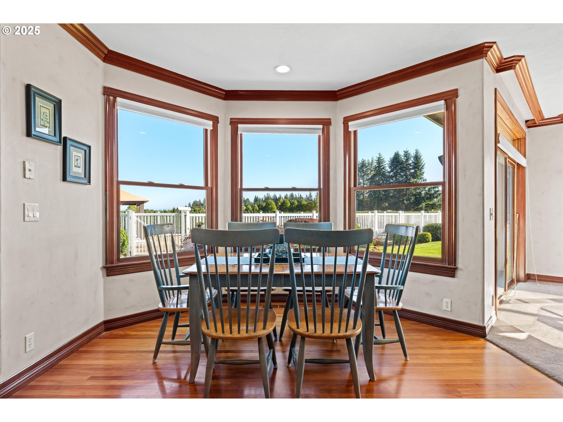 13680 Southwest Morgan Road Sherwood, OR 97140 - Photo 32 of 48 a view of a dining room with furniture window and wooden floor