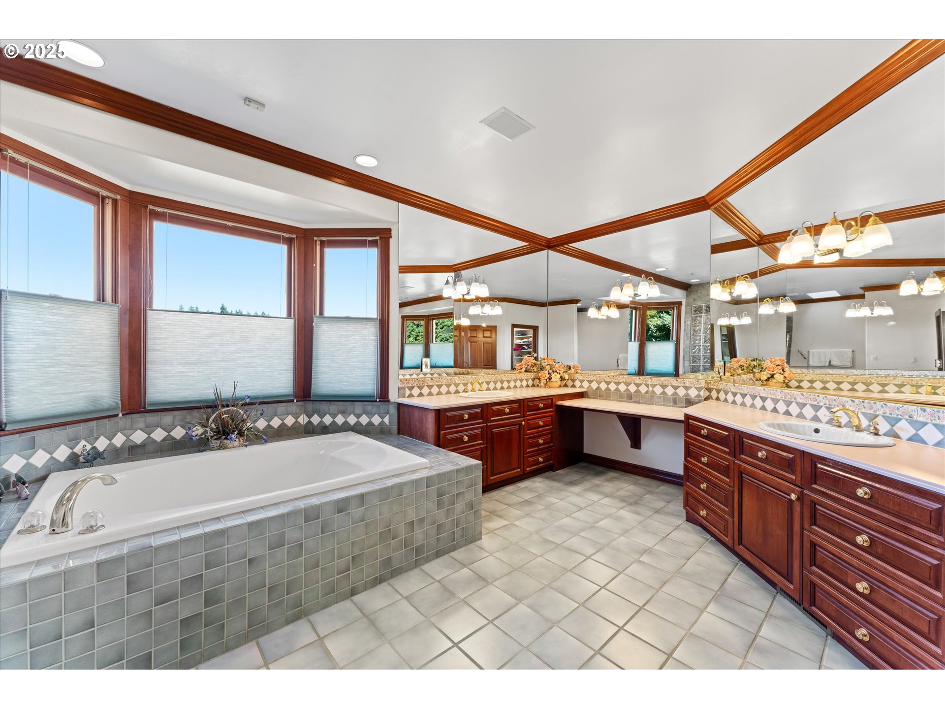 13680 Southwest Morgan Road Sherwood, OR 97140 - Photo 38 of 48 a spacious bathroom with double vanity and a bathtub