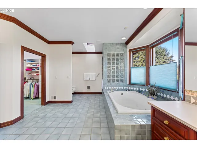 a bathroom with a bathtub and a sink