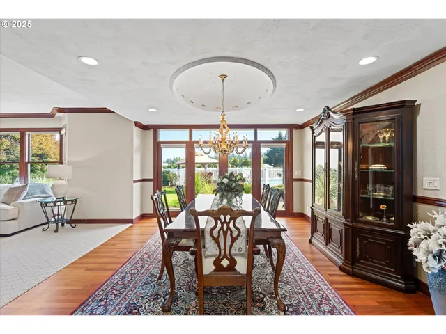 a view of a dining room with furniture window and outside view