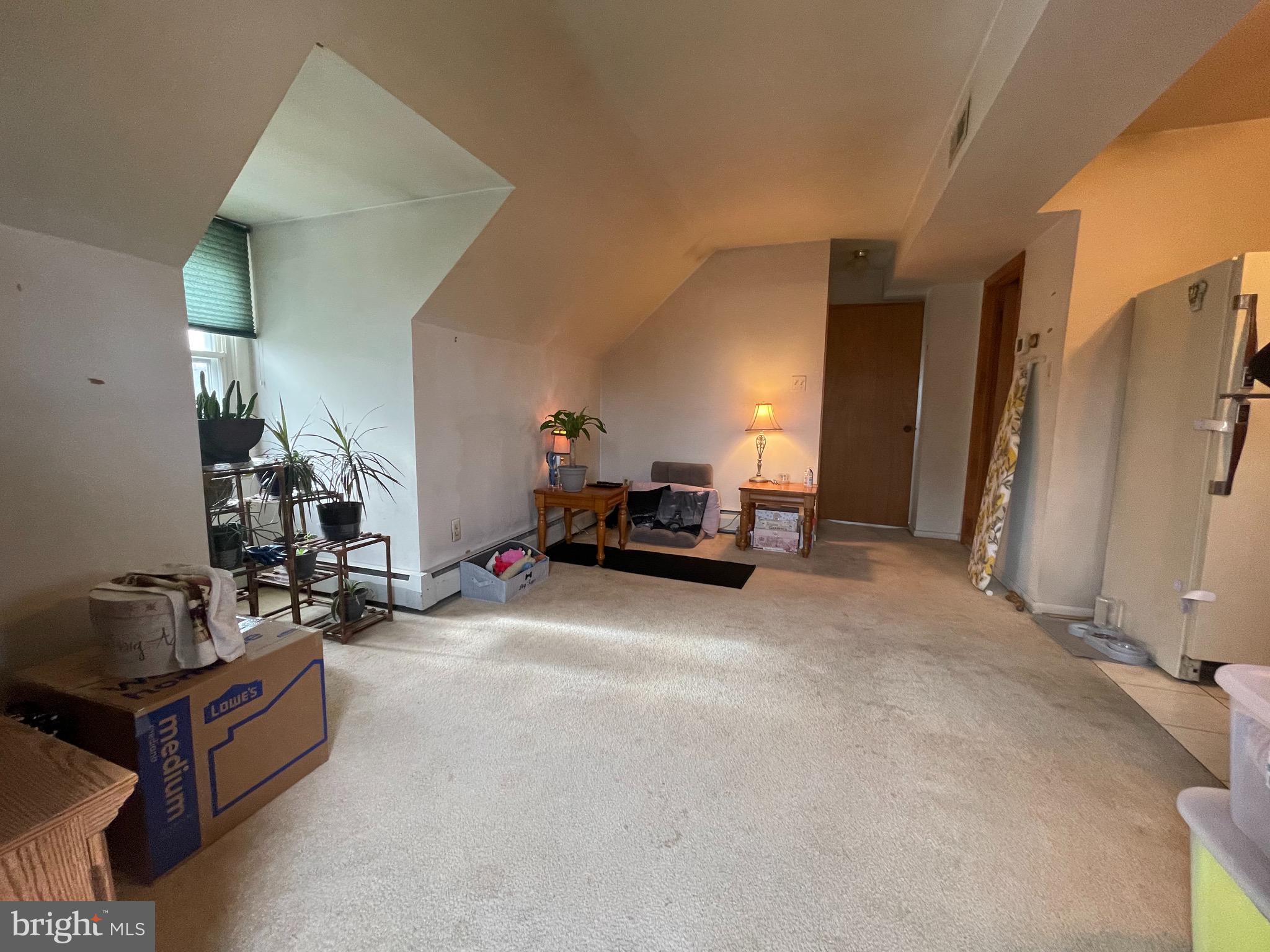 300 Charles Road Linthicum Heights, MD 21090 - Photo 20 of 28 Apartment-Living room on the upper level.