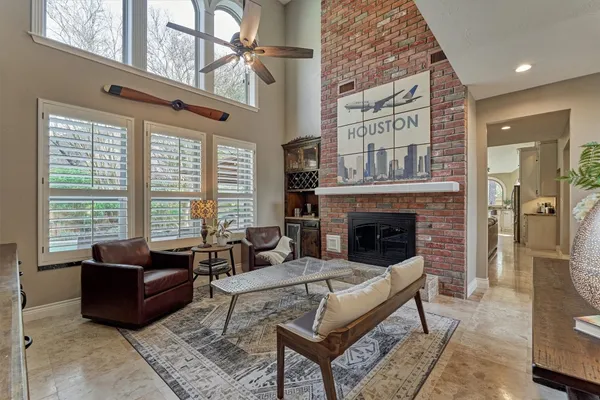 a bed room with a bed and a chandelier