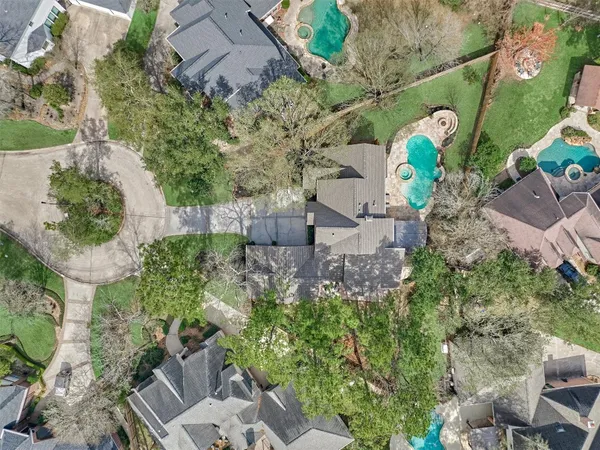 an aerial view of a house with a garden