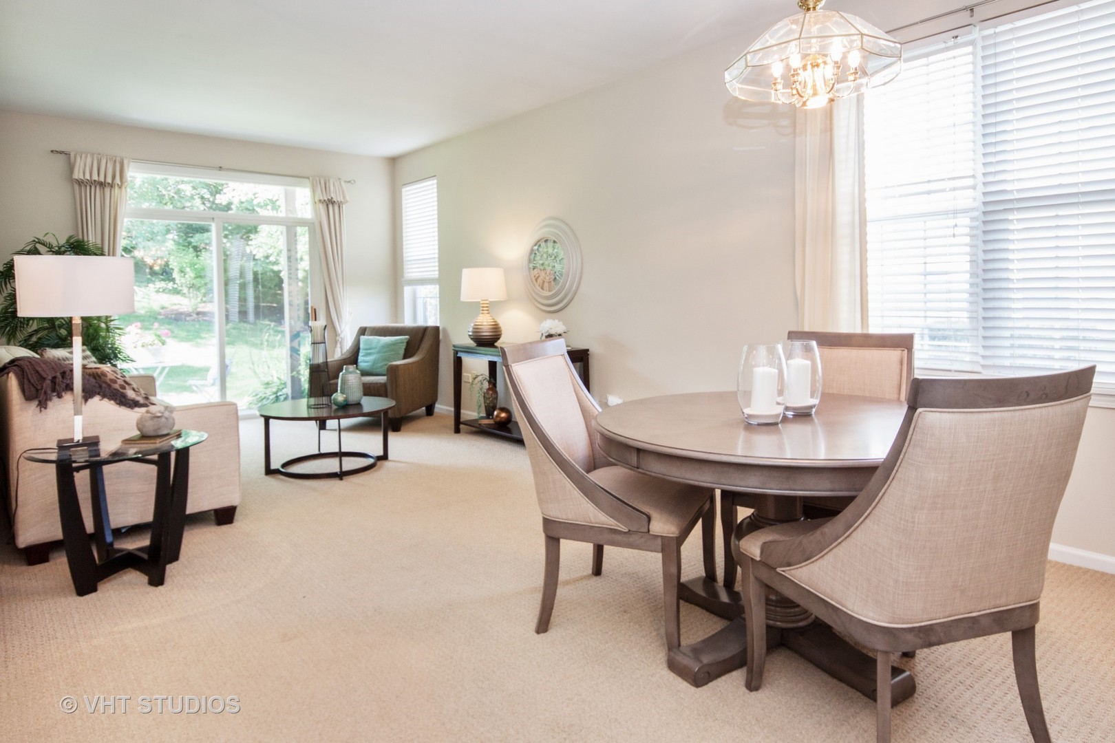 2460 Oneida Lane, Unit 2460 Naperville, IL 60563 - Photo 12 of 16 a view of a dining room with furniture and a large window