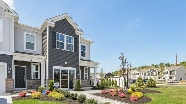 a kitchen with a sink stove and microwave