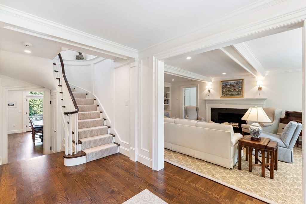 109 Edmunds Road Wellesley, MA 02481 - Photo 5 of 29 a living room with furniture and a fireplace