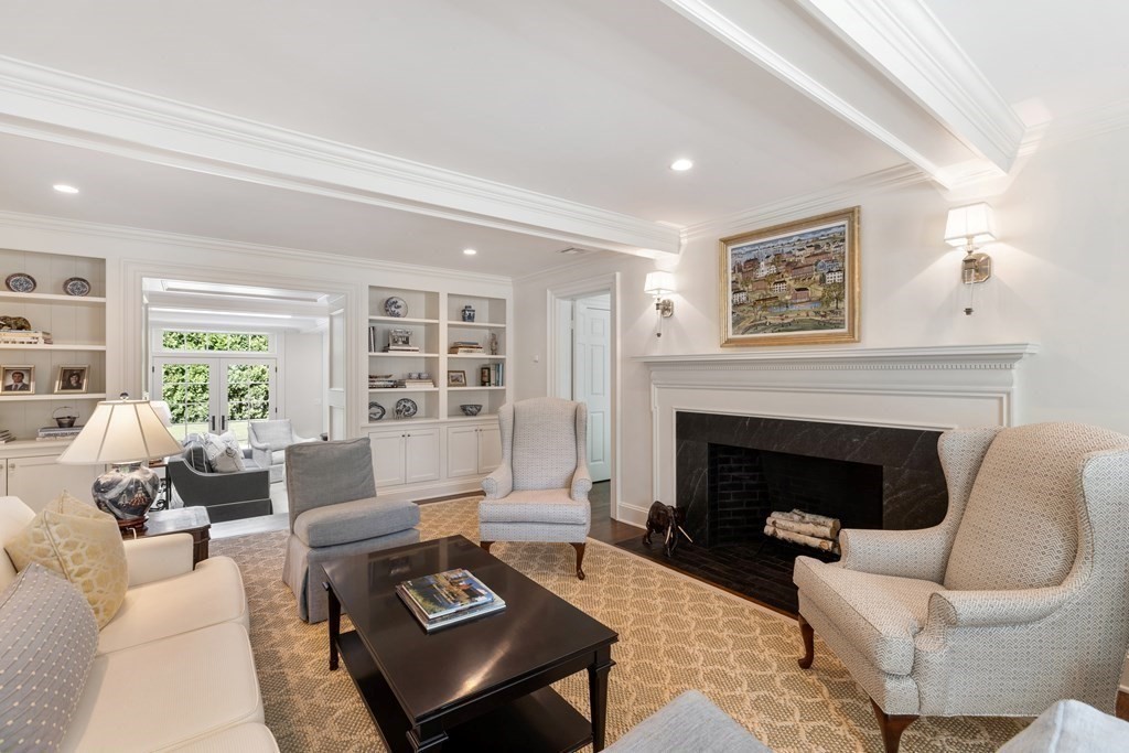 109 Edmunds Road Wellesley, MA 02481 - Photo 6 of 29 a living room with furniture and a fireplace