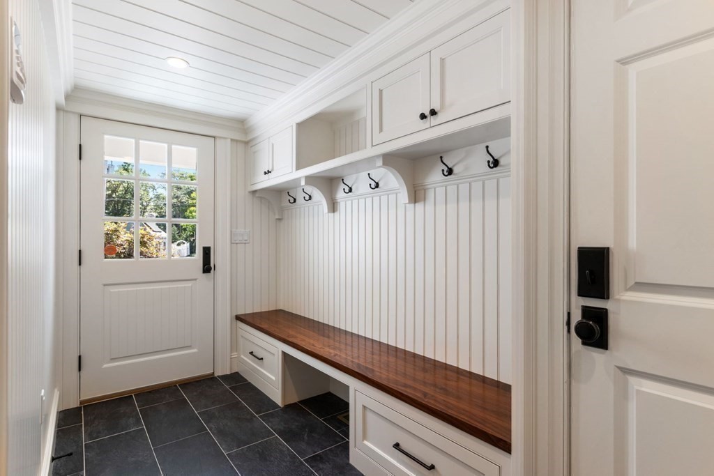 109 Edmunds Road Wellesley, MA 02481 - Photo 10 of 29 a room with white cabinets and white appliances