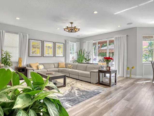 a kitchen with stainless steel appliances a stove a refrigerator and cabinets