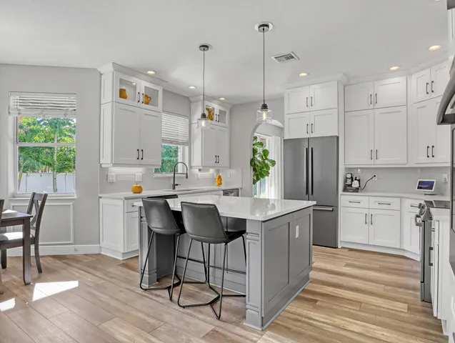 a bathroom with a bathtub and shower