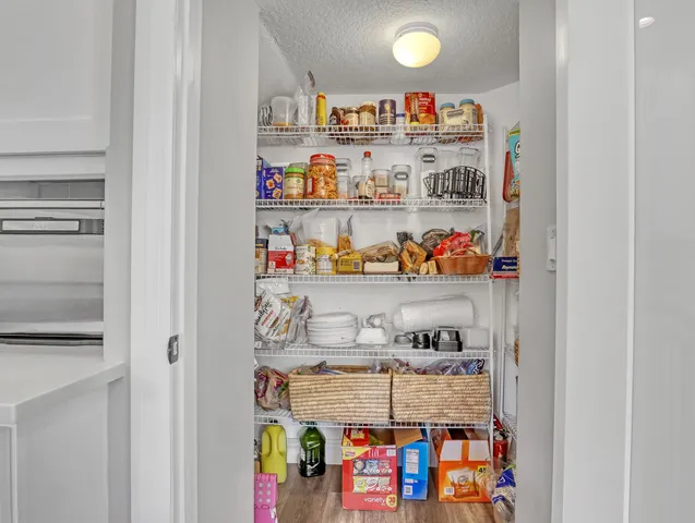 a bedroom with a bed and flat screen tv