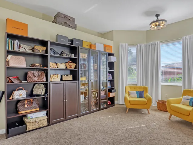 a house view with a sitting space and garden space