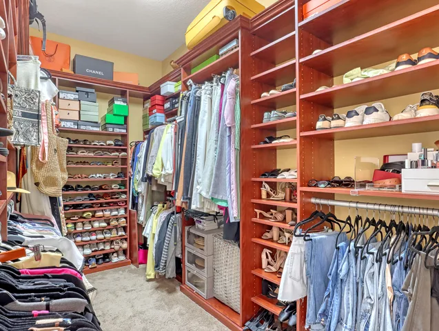 a view of a backyard with sitting area