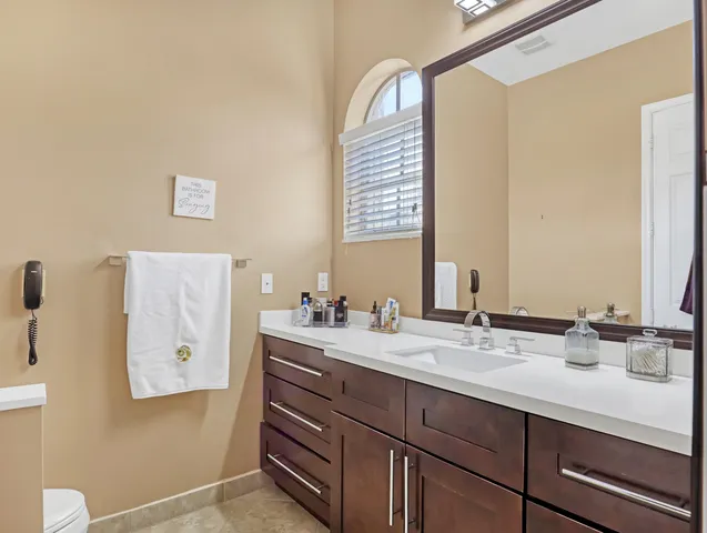an aerial view of a house with a garden