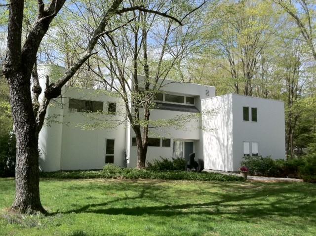 32 Side Cut Road Redding, CT 06896 - Photo 1 of 1 a white house that has a tree in front of a house