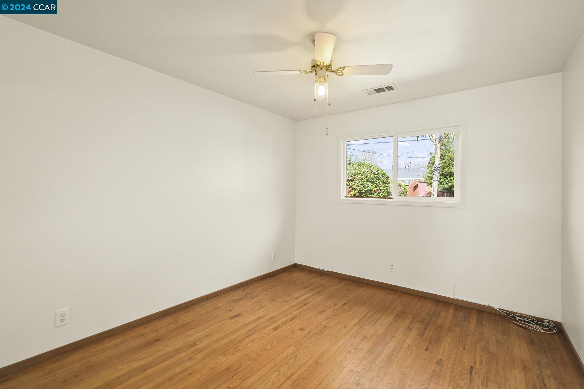 Undisclosed Address Dublin, CA 94568 - Photo 17 of 28 an empty room with a window