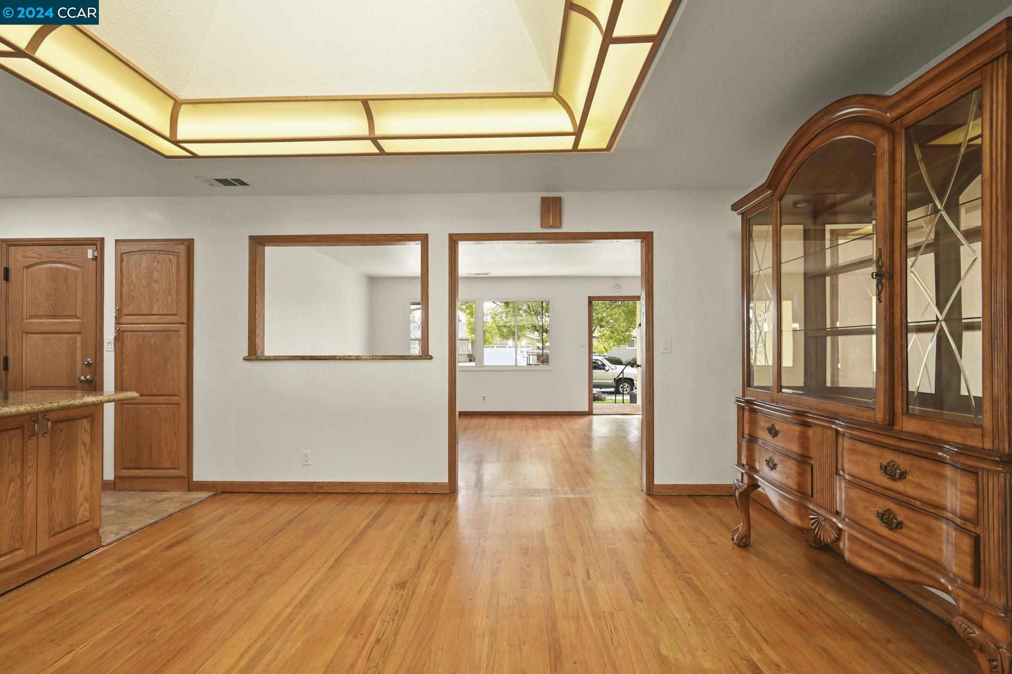 Undisclosed Address Dublin, CA 94568 - Photo 8 of 28 wooden floor in an empty room with a window