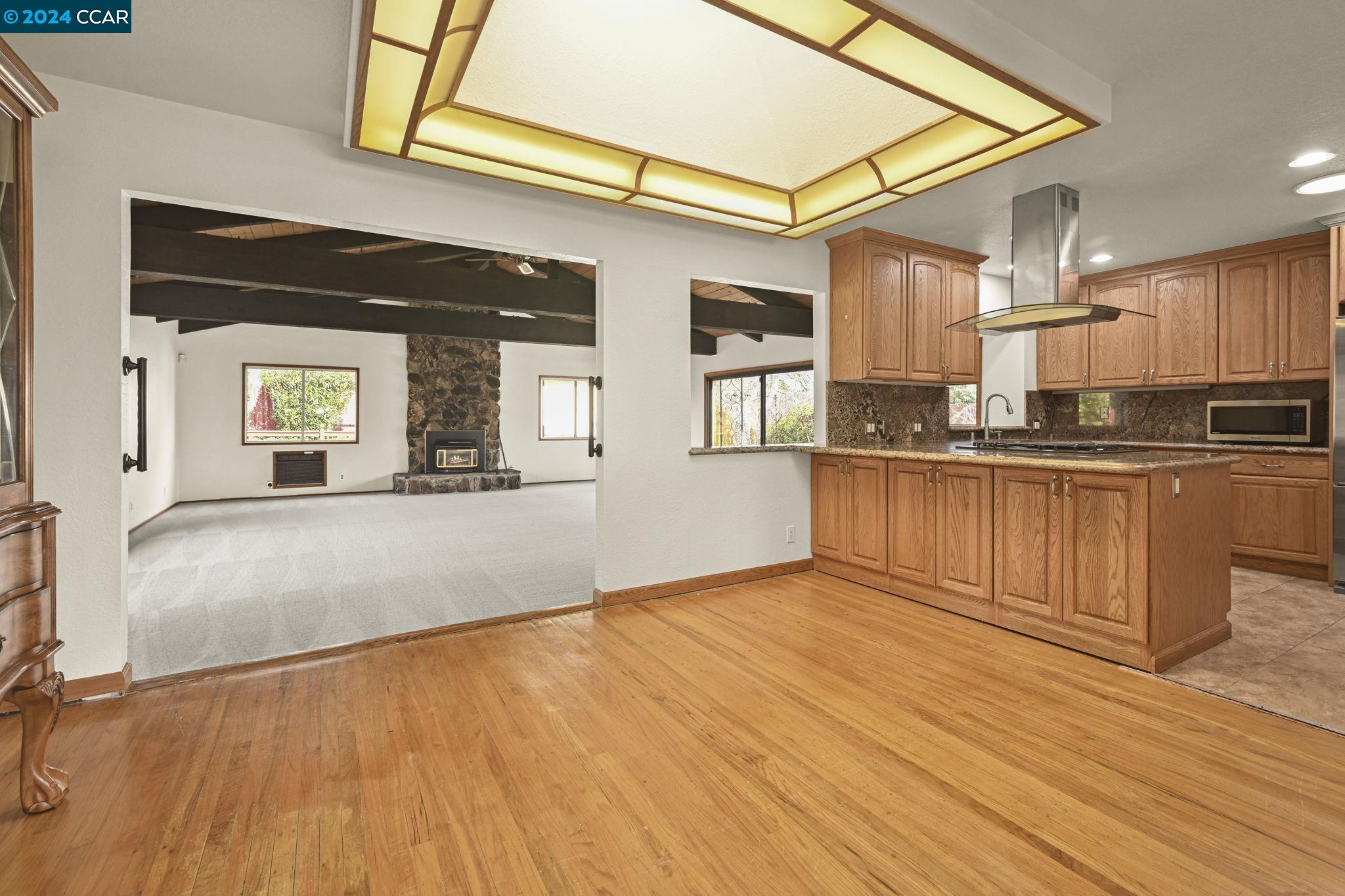Undisclosed Address Dublin, CA 94568 - Photo 9 of 28 a view of a kitchen with kitchen island wooden floor and stainless steel appliances