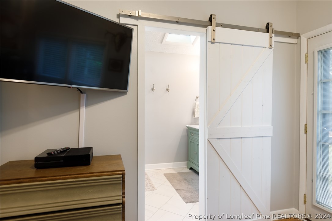 2519 Huntington Road Fayetteville, NC 28303 - Photo 27 of 36 a bathroom with a sink